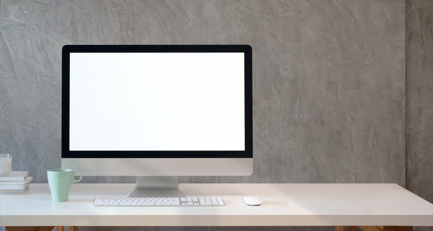 Photo Of Computer On Desk